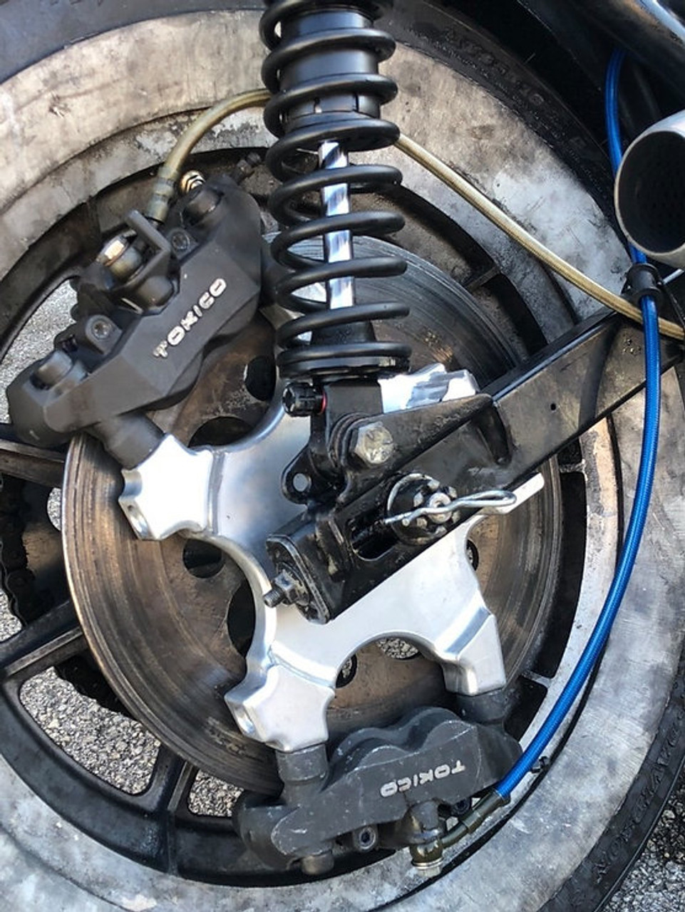 COCK'S ハーレー スポーツスター キャリパーブラケット｜AxxL